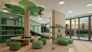 Imagem ilustrativa da brinquedoteca com piscina de bolinha, casinha para escalar, mesa redonda para artes, pufs e estante para livros e brinquedos